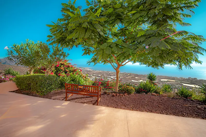 Garden bench with coastal views at Villa Monaco Adeje Tenerife