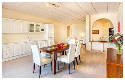 Open plan kitchen and dining area in the apartment at Villa Monaco Adeje Tenerife Open plan kitchen and dining area in the apartment at Villa Monaco Adeje Tenerife