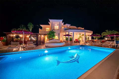 Pool terrace at night at Villa Monaco Adeje Tenerife